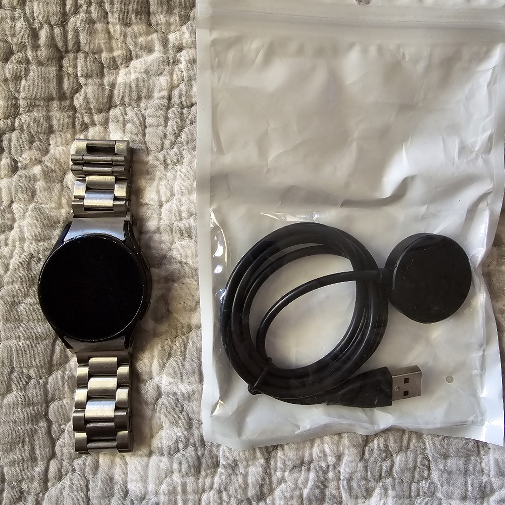 Samsung Galaxy Watch 4, 40mm face, metal watch band, charger cable
